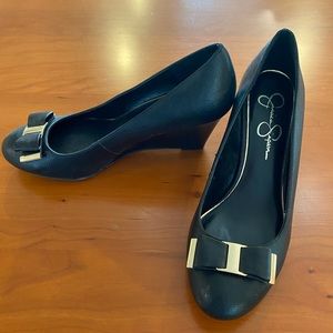 Jessica Simpson size 9 black closed toe wedges with gold accent bow